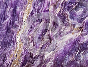 Background from tumbled charoite gemstone