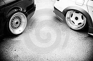 Background of tuning cars on street, black and white effect