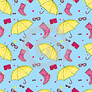 Background of umbrellas, rubber boots, handbags and eyewear. Spring and autumn shoes and accessories. Fashion