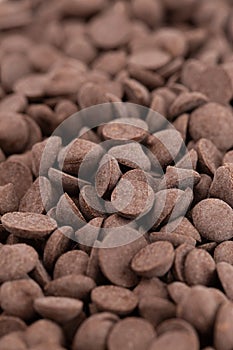 Background of Unsweetened Carob Chips a Healthy Alternative to C photo