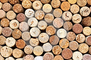 Background of used wine corks, wall of many different wine corks closeup