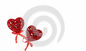 Background for Valentine`s Day. Red creative hearts with bow isolated on white background. Greeting card layout for Valentine`s