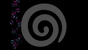 Background with a variety of multi-colored translucent soap bubbles.