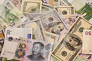 Background of various currency banknotes, dollar, euro, yuan