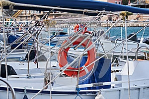 Background - various pleasure and recreational fishing boats in the harbor