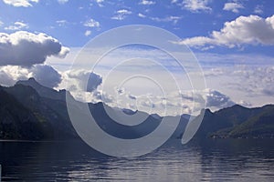 Background view of the lake traunsee among the high mountains in the alps, around Gmunden, Austria