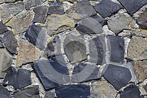 Background from a wall of granite stones