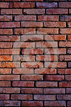 Background is wall old red burnt brick