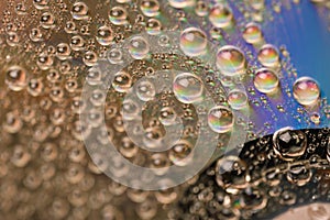 Background of water drops on the glass surface of compact disc