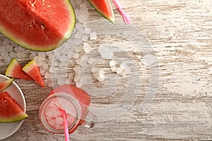 Background with watermelon drink with ice on table top view