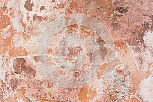 Background: weathered red paint on concrete wall