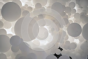 A background with white balloons