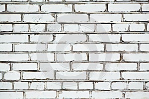 Background white brick wall with dark seams