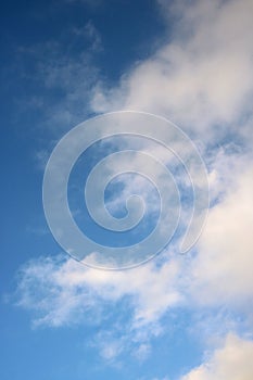Background of white clouds against a blue sky
