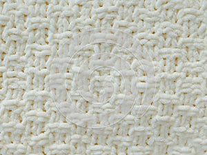 Background of white knitted plaid