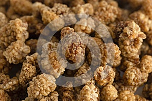 A Background of White Organic Dried Mulberries