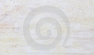 background of white wooden vintage wall with floral emboss details