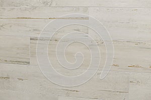 Background of a white wooden wall from modern tiled blocks in room. Finish wall tiles abstract texture. Luxury light themed