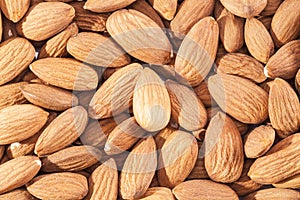 Background of whole almonds group close up