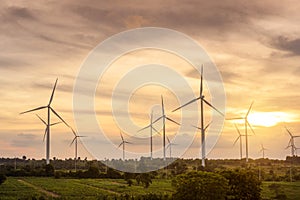 Background of wind turbines fields at sunset , ecological conservation concept