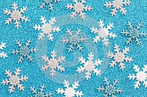 A Background of Winter Glitter Snow Flakes