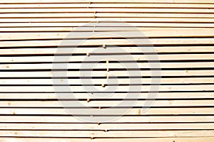 Background from wooden boards close-up. Stacked stacks of wooden planks