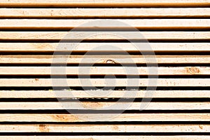 Background from wooden boards. Stacked stacks of wooden planks. Lumber warehouse, wood drying, building material.