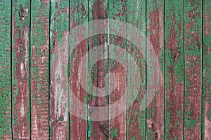 Background wooden fence with green cracked paint for writing close-up texts