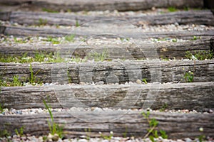 Background of wooden steps, grass and stones