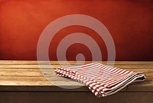 Background with wooden table and tablecloth