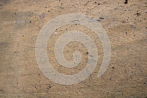 Background of worn plywood or ocume. Work bench used during welding