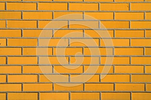 Background with yellow bricks wall for interior design