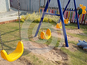 Background yellow swings