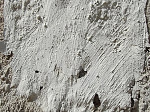 The background for your design is an image. a wall of old gray cracked rough concrete. cement plaster on brick. retro style, rough