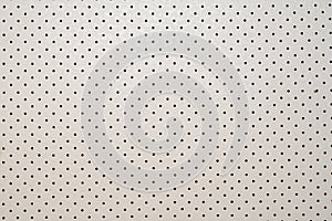 Backgrounds and textures from leather in white with a perforation