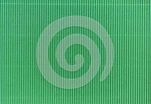 Backgrounds and textures: paper corrugated background. Green, vertical stripe.