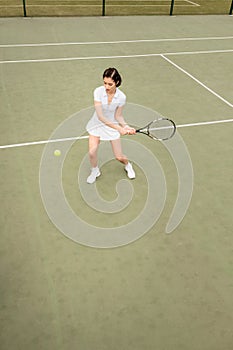backhand, overhead view of female player