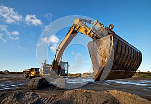 backhoe in action on a construction site close up