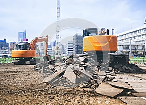 Backhoe Loader digger work at building construction site outdoor