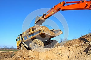 Backhoe loader loading dumper