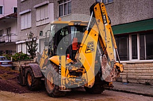 Backhoe Loader In A Street