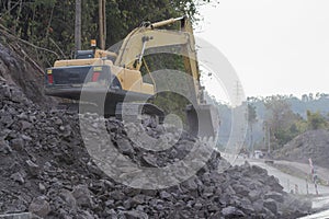 Backhoe:Road construction in mountains Khao kho ph