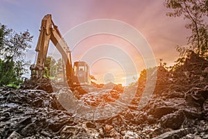 Backhoe to excavate the soil on the ground construction site