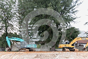 Backhole on the beach  under-construction