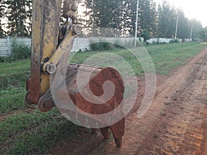 Backhole , Heavy equipment machinery working on ground.