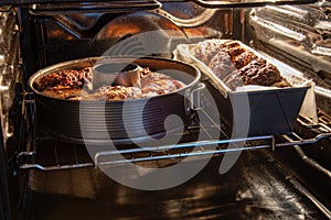 Backing two chocolate cake in different backing pans in the oven