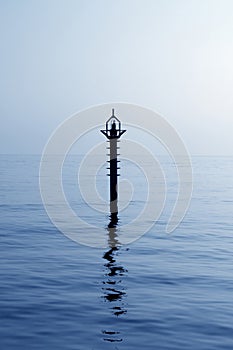 Backlight beacon in Mediterranean blue sea