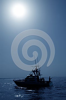 Backlight on blue water sport fishing boat