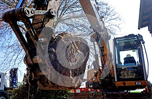 Backlight shot with lensflare from an excavator with a fully loaded shovel