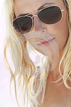 Backlit Blond Girl In Aviator Sunglasses